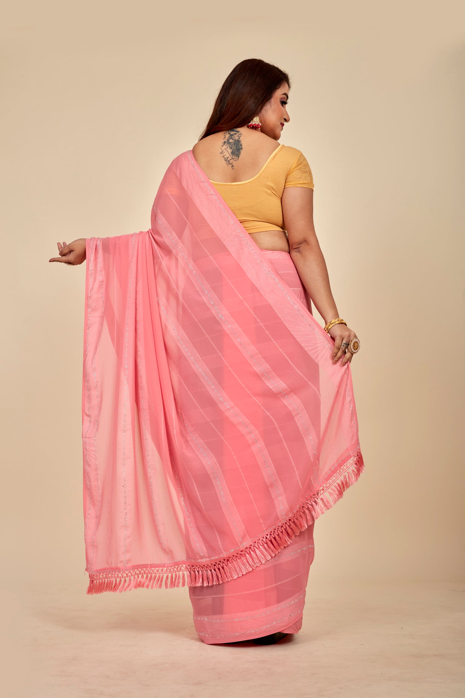 Coral pink satin Stripes Georgette Mahalasa Saree with satin Swarovski border and stripes with fine Swarovski work and jhalar fringe